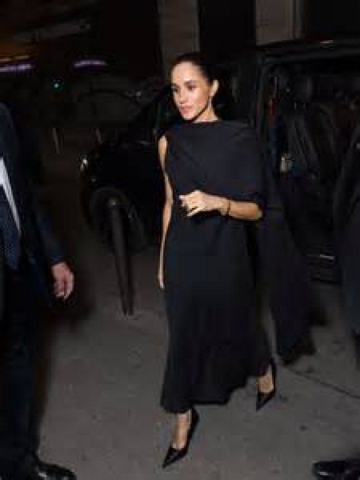 Meghan Markle Wears Incarlet Re-Enactment of Carolina Herrera Gown: A Royal Fashion Statement